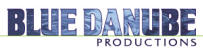 Blue Danube Productions logo: photo of shimmering green, orange, red, purple and blue lights shining down on a backdrop